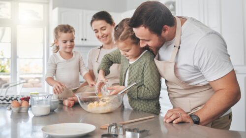 Baking,Cookies,Is,Comforting.,Shot,Of,A,Family,Baking,Together